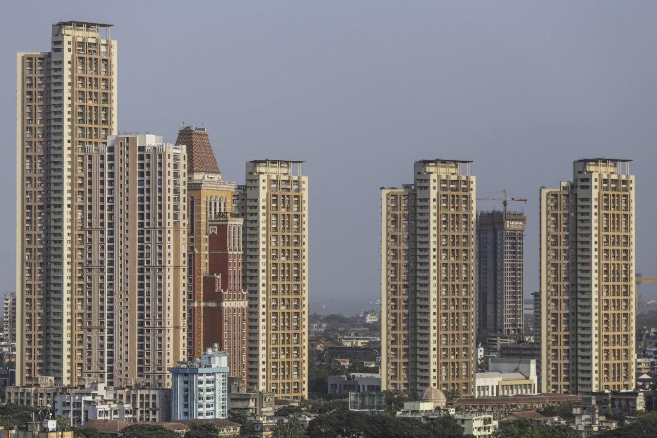 Towers stand among other residential and commercial buildings in the Mahalaxmi area of Mumbai. (Photographer: Dhiraj Singh/Bloomberg)